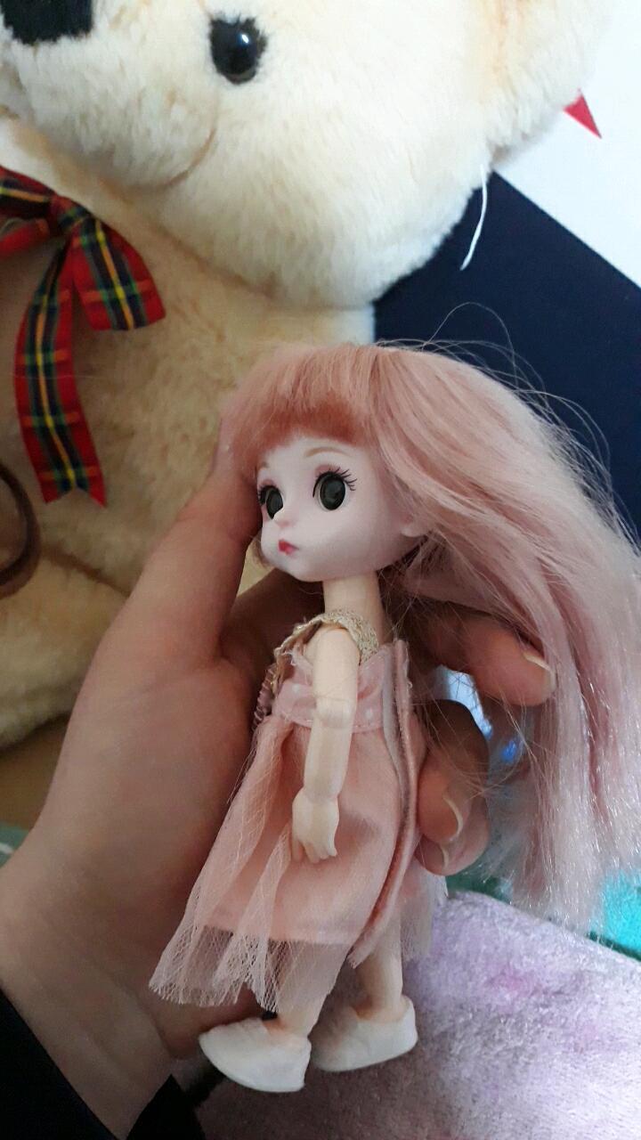 인형 옷 다시 입힌 사진이야.