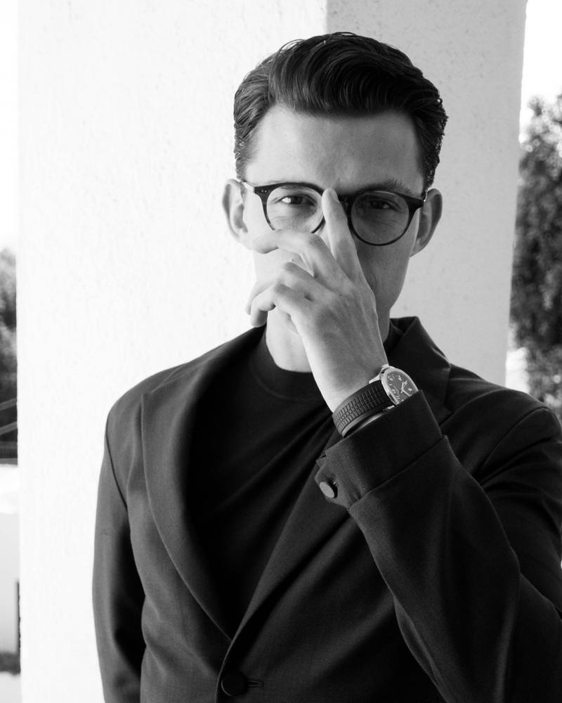 #10 wearing suit